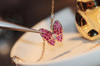 ??Loco?¡¥BUTTERFLY RED DIAMOND ROSE GOLD NECKLACE