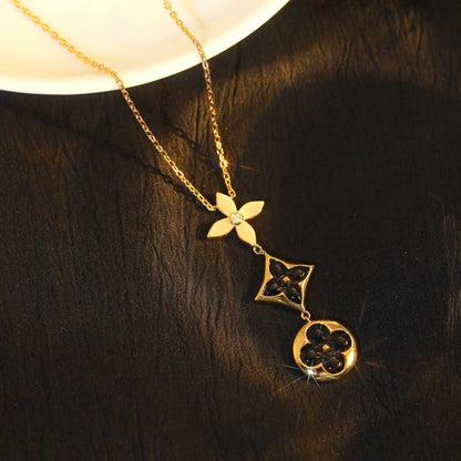 [moco jewelrys] Halskette aus Onyx, Stern und Sonne, roségolden
