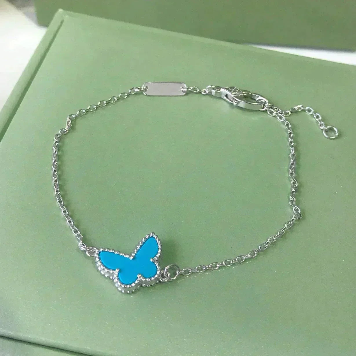 [moco jewelrys]Türkisfarbenes Schmetterlingsarmband aus Silber