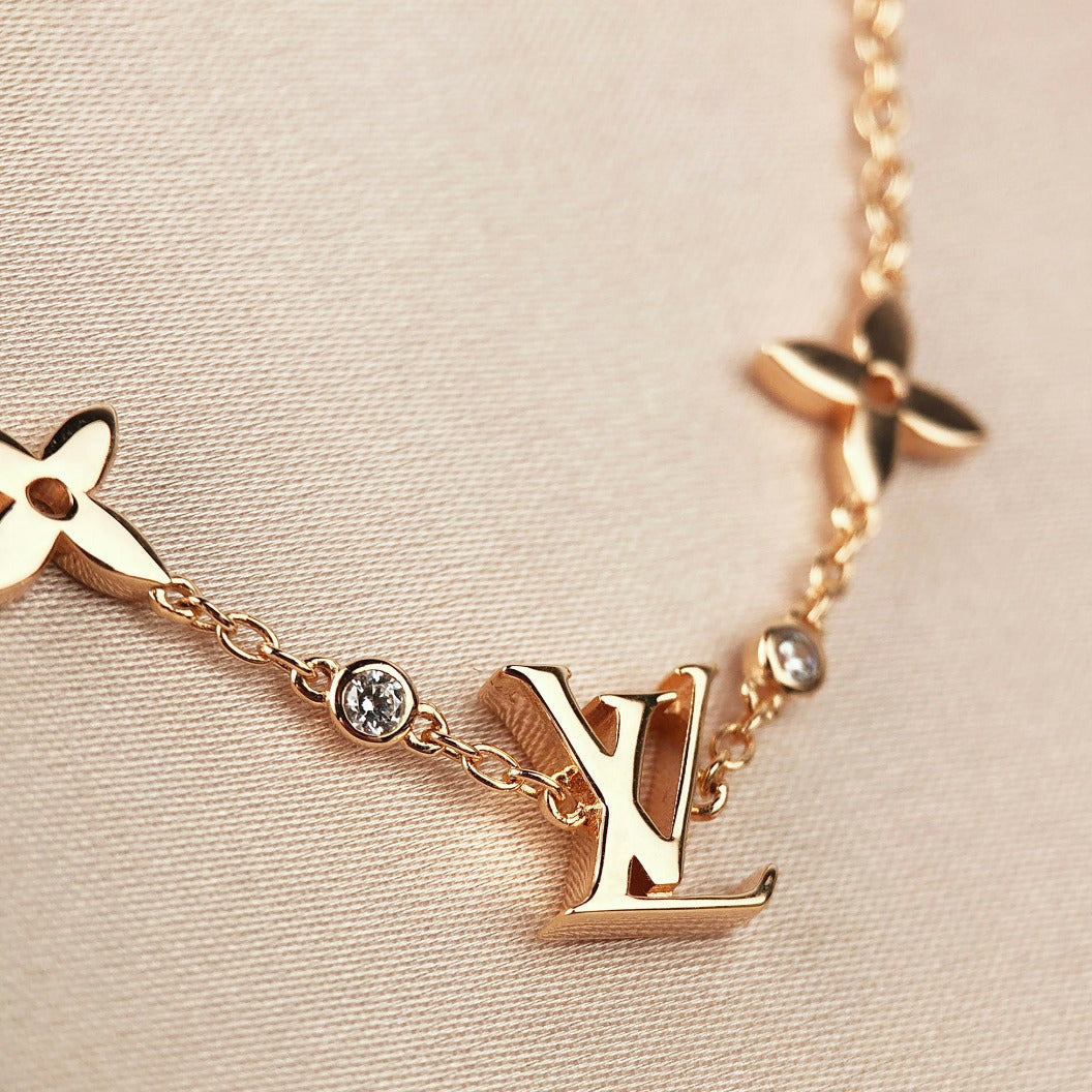 ??Loco?¡¥STAR AND SUN 7 MOTIFS GOLD BRACELET