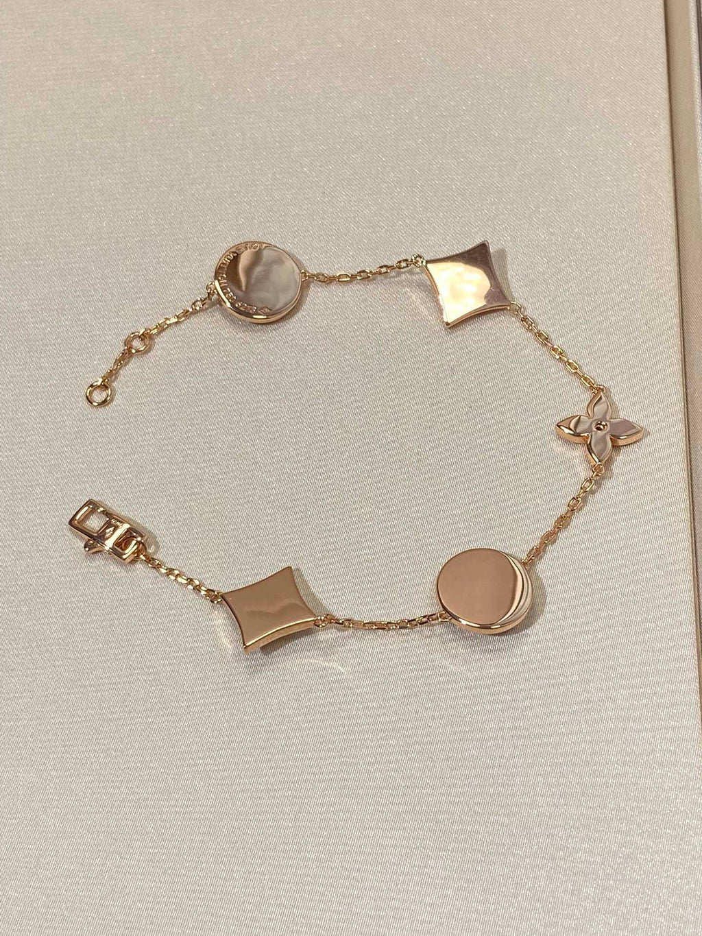 ??Loco?¡¥STAR AND SUN 5 MOTIF MOP PINK GOLD BRACELET
