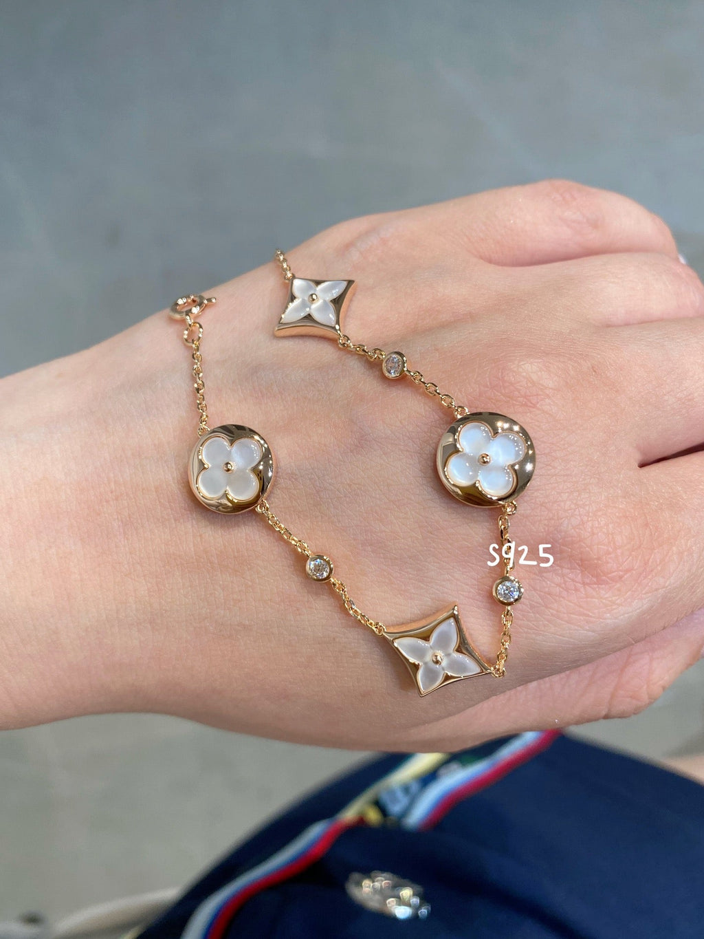 ??Loco?¡¥STAR AND SUN 4 MOTIF WHITE MOP PINK GOLD BRACELET