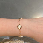 ??Loco?¡¥STAR AND SUN 4 MOTIF WHITE MOP PINK GOLD BRACELET