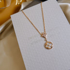 ??Loco?¡¥STAR AND SUN WHITE MOP 2 MOTIF PINK GOLD NECKLACE