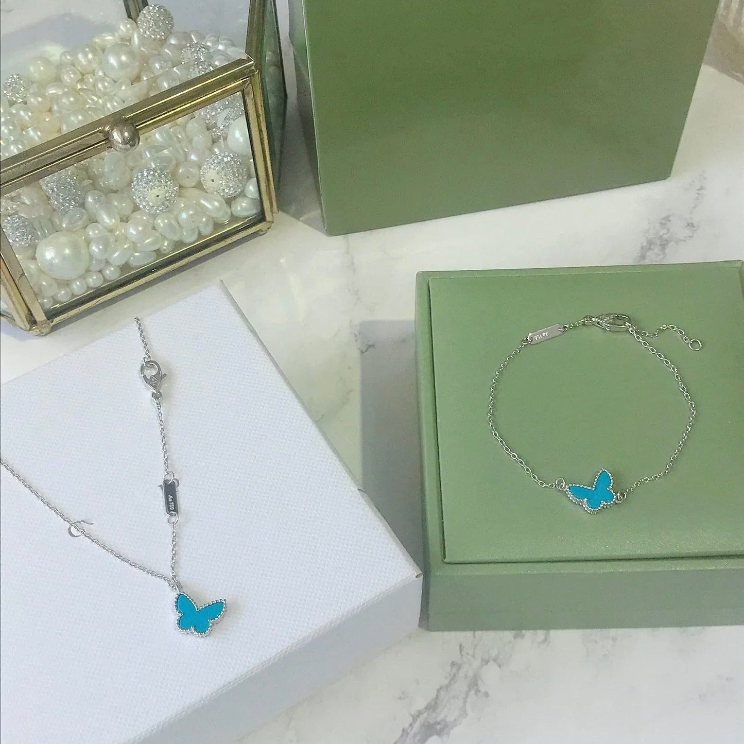 [moco jewelrys]Türkisfarbenes Schmetterlingsarmband aus Silber