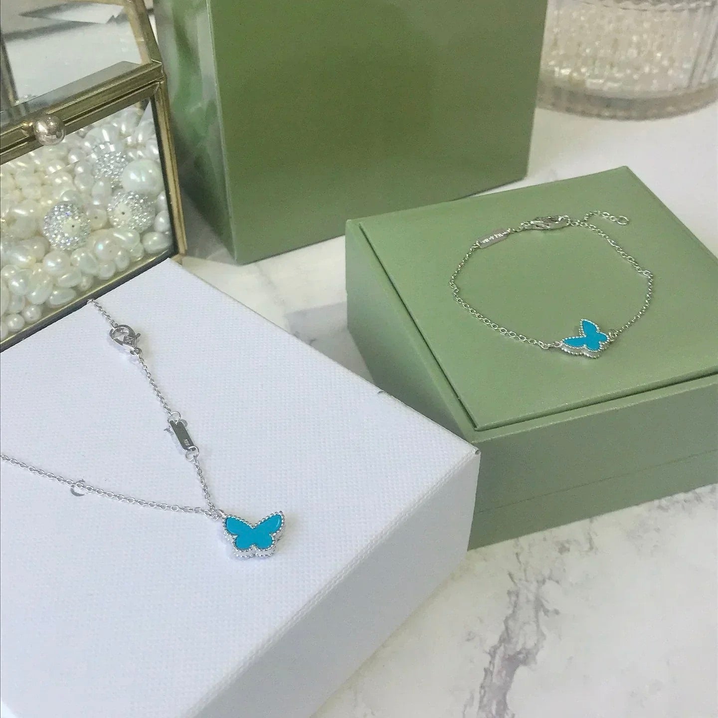 [moco jewelrys]Türkisfarbenes Schmetterlingsarmband aus Silber