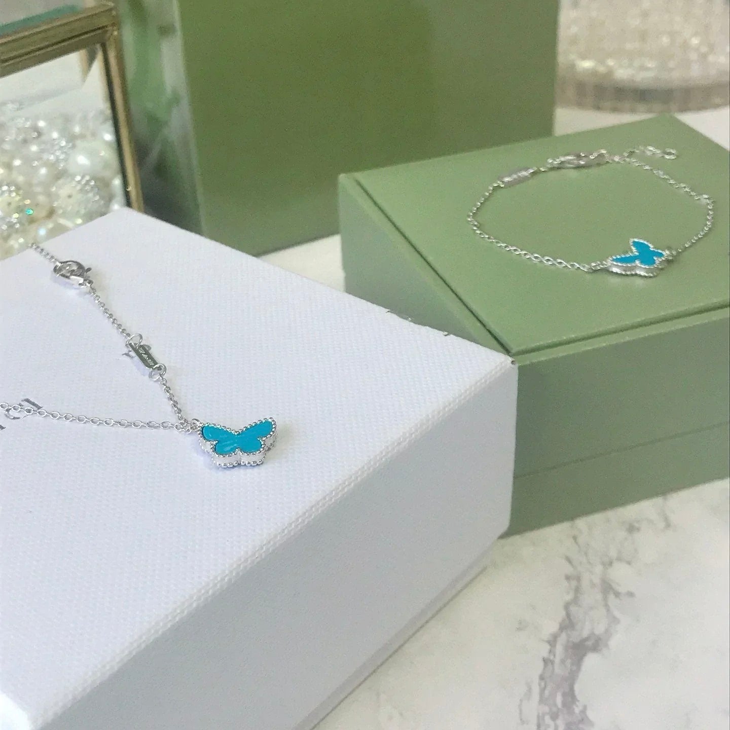 [moco jewelrys]Türkisfarbenes Schmetterlingsarmband aus Silber