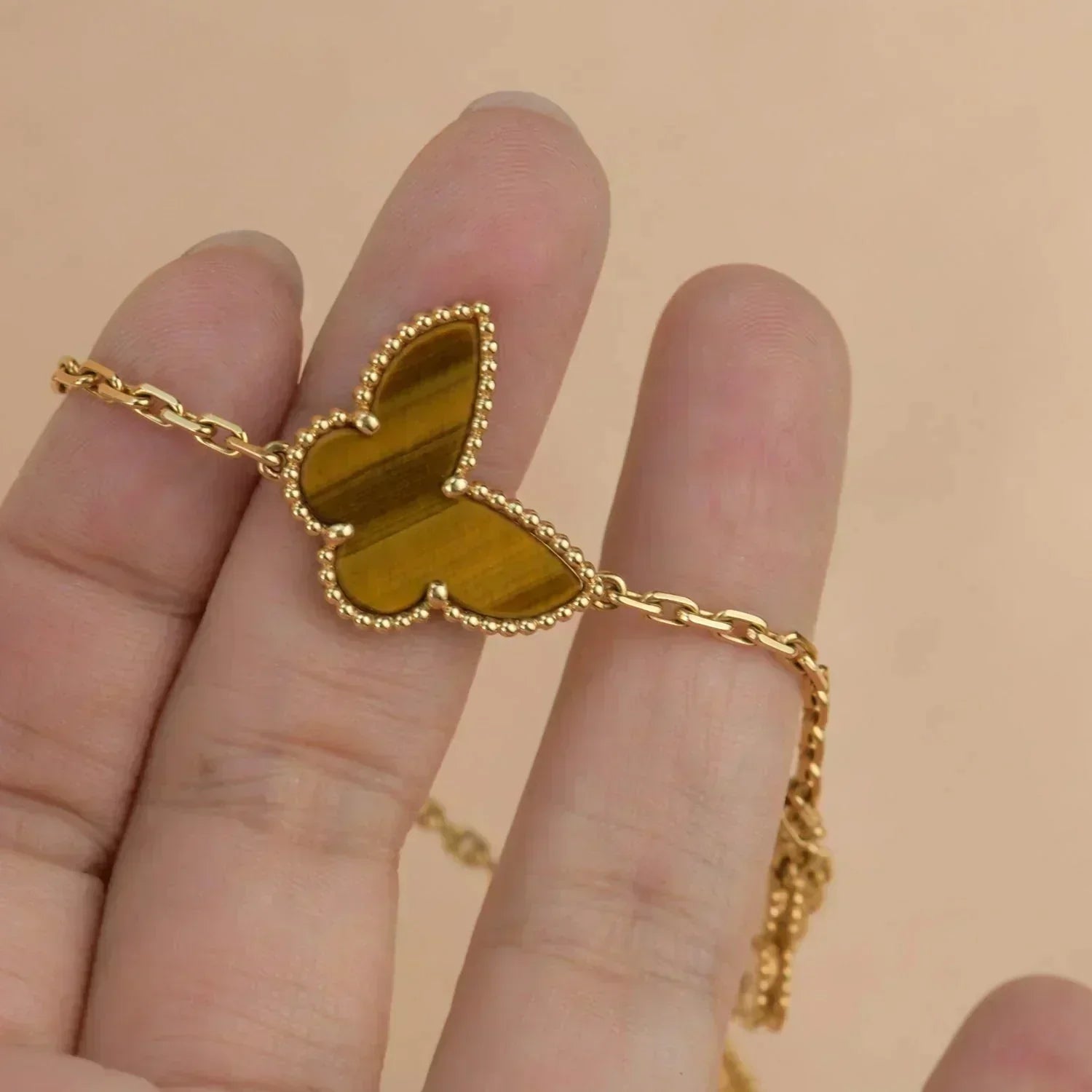 ??Loco?¡¥LUCKY SPRING 5 MOTIF GOLD BRACELET