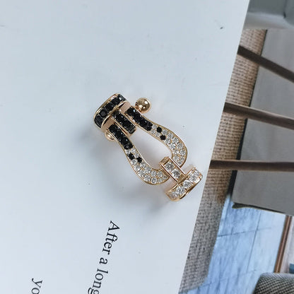 [moco jewelrys] Großes Hufeisenarmband in Schwarz-Weiß mit Diamanten in Roségold