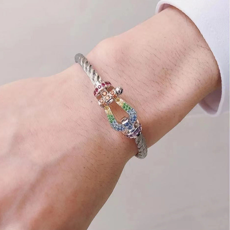 [moco jewelrys] Großes Hufeisen-Armband mit farbigen Diamanten, Silber