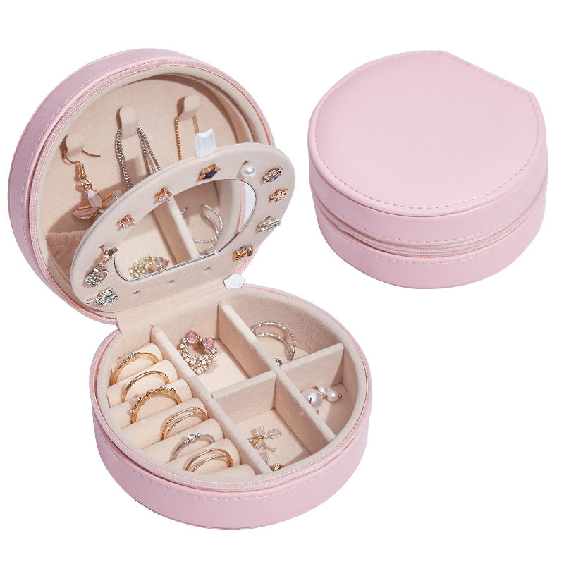 Runde Schmuckschatulle aus Leder, tragbar, ideal für Reisen und zur Aufbewahrung von Schmuck.