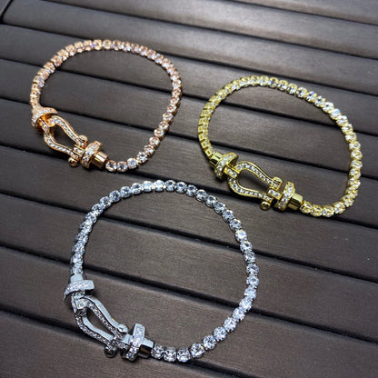 [moco jewelrys] Großes Horseshoe Tennisarmband mit Diamanten 