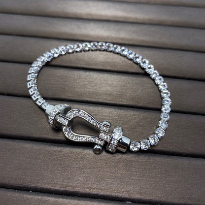 [moco jewelrys] Großes Horseshoe Tennisarmband mit Diamanten 