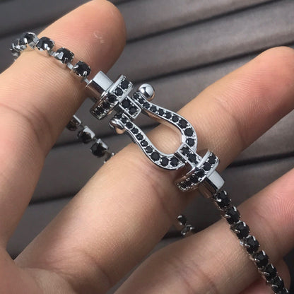 [moco jewelrys] Großes Horseshoe Tennisarmband mit Diamanten 
