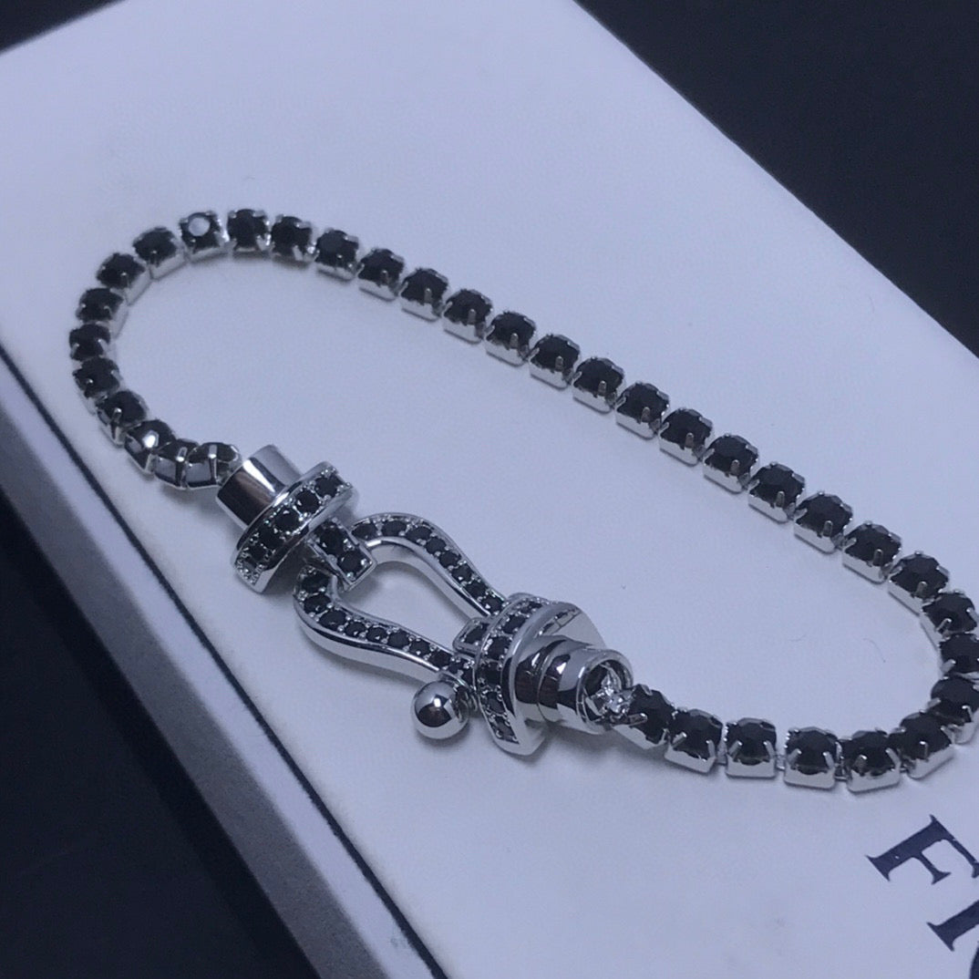 [moco jewelrys] Großes Horseshoe Tennisarmband mit Diamanten 