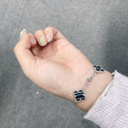 ??Loco?¡¥CLOVER 5 MOTIF VEINED ONYX BRACELET SILVER