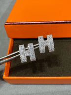 ??Loco?¡¥H STUD EARRINGS WITH SILVER DIAMONDS