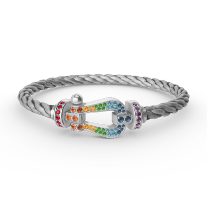 [moco jewelrys] Großes Hufeisen-Armband mit farbigen Diamanten, Silber