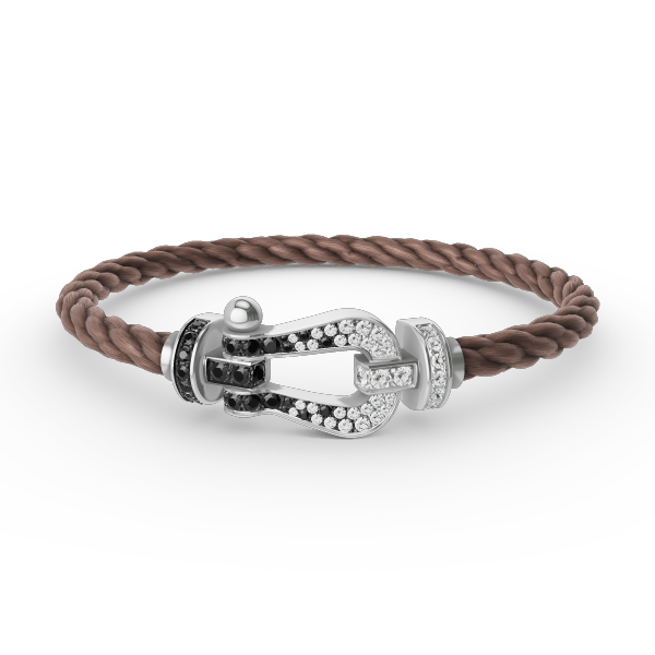 [moco jewelrys] Großes Hufeisenarmband mit schwarzen und weißen Diamanten, Silber