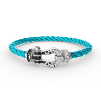 [moco jewelrys] Großes Hufeisenarmband mit schwarzen und weißen Diamanten, Silber