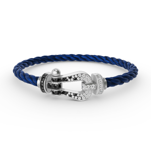[moco jewelrys] Großes Hufeisenarmband mit schwarzen und weißen Diamanten, Silber