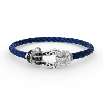 [moco jewelrys] Großes Hufeisenarmband mit schwarzen und weißen Diamanten, Silber