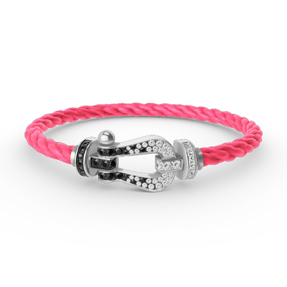 [moco jewelrys] Großes Hufeisenarmband mit schwarzen und weißen Diamanten, Silber