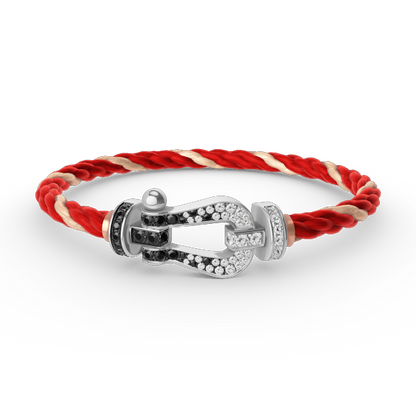 [moco jewelrys] Großes Hufeisenarmband mit schwarzen und weißen Diamanten, Silber