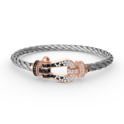[moco jewelrys] Großes Hufeisenarmband in Schwarz-Weiß mit Diamanten in Roségold