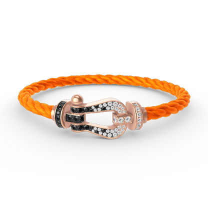 [moco jewelrys] Großes Hufeisenarmband in Schwarz-Weiß mit Diamanten in Roségold