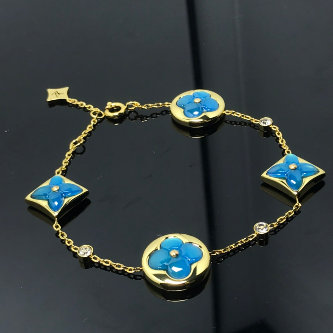 ??Loco?¡¥STAR AND SUN 4 MOTIF BLUE BRACELET